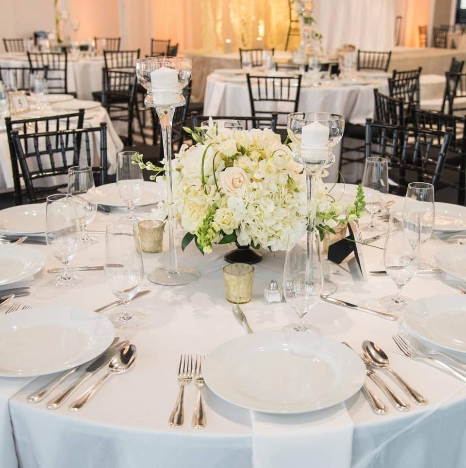 White wedding floral arrangement and table decor at The Penthouse Hyde Park